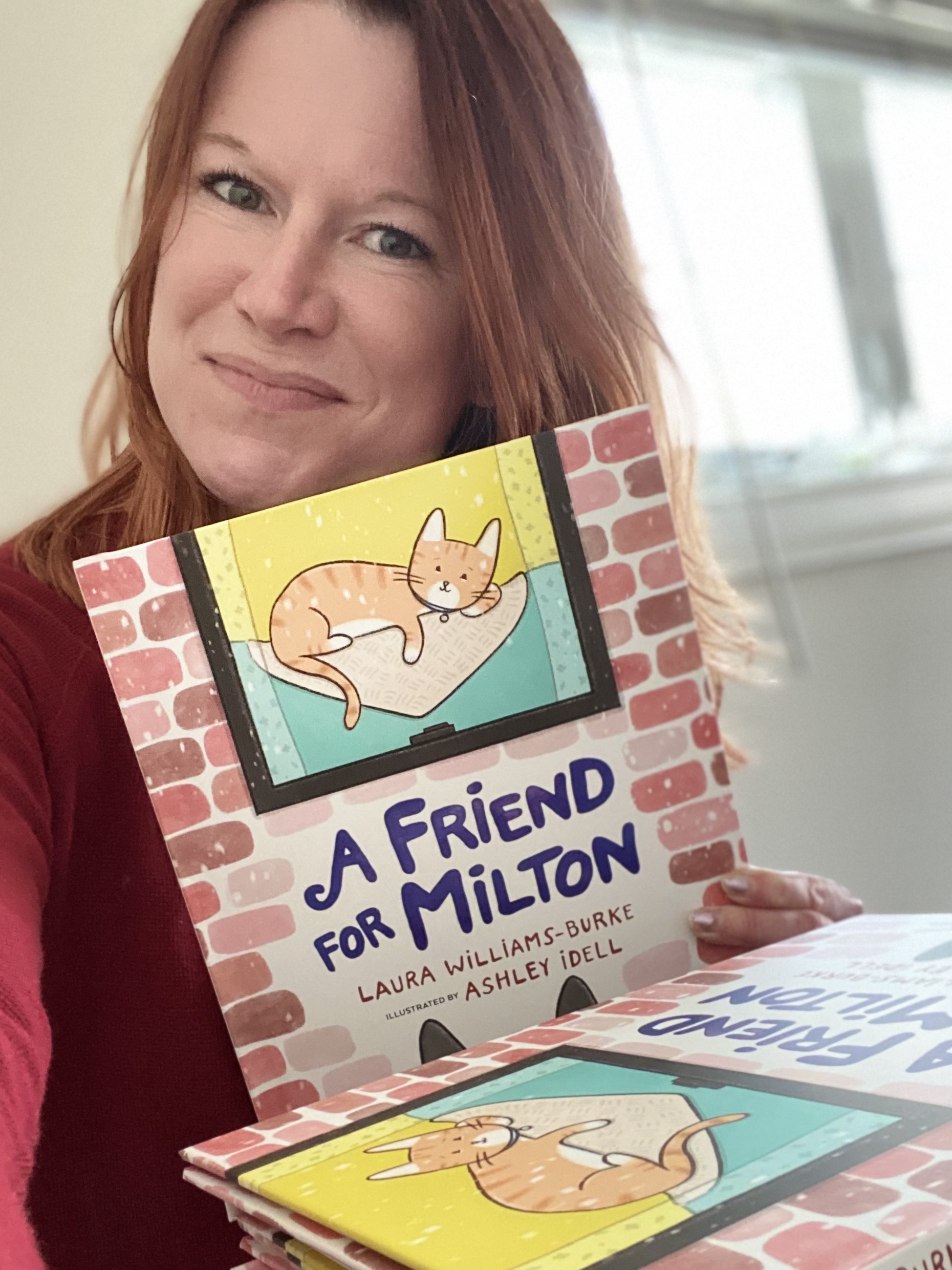 Author Laura Williams-Burke with her MCA award-winning book, "A Friend for Milton!"